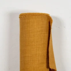 Nordisk Textil Gardintyger Enfärgade|Milo ockra gardintyg - Stilrent med fin struktur
