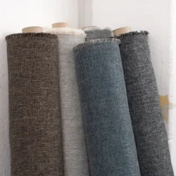 Nordisk Textil Enfärgade Möbeltyger|Omega Sand - Slitstarkt och vävt möbeltyg med melerad struktur